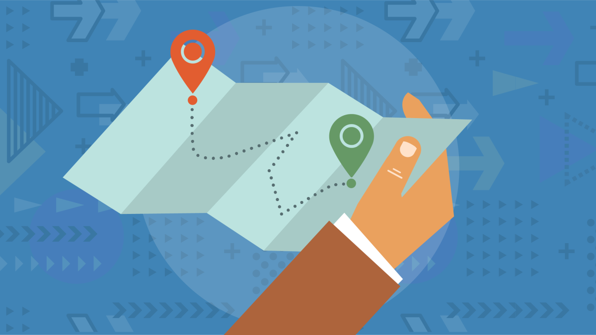 Hand holding map with starting and end points