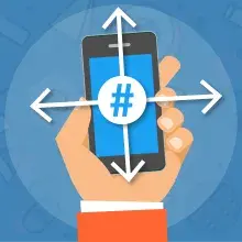 Icon showing hand holding mobile device with hashtag on screen
