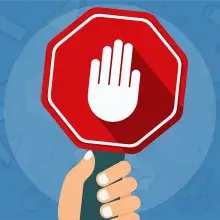 Icon showing hand holding stop sign